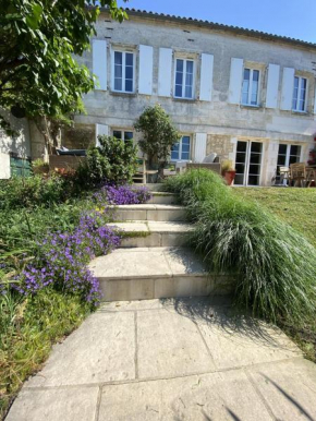 Grande maison centre ville avec jardin et piscine